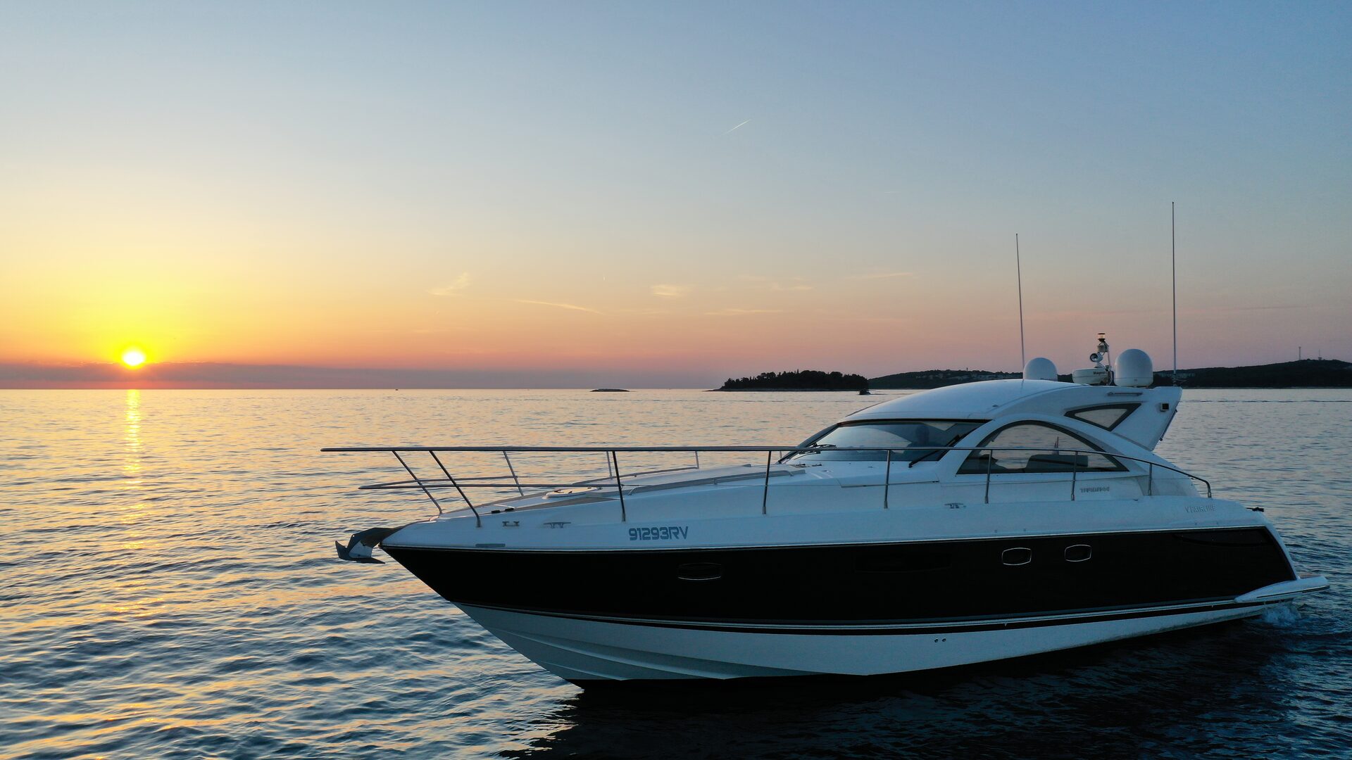 Luxury yacht cruising the Adriatic at golden hour
